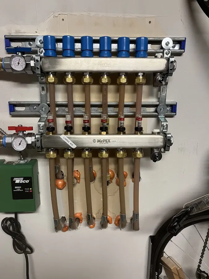 Plumber performing Water Heater Repair at a residential property in Lehigh